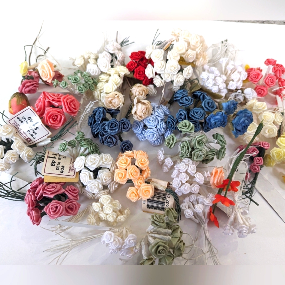 34 individual bunches of mini artificial flowers.